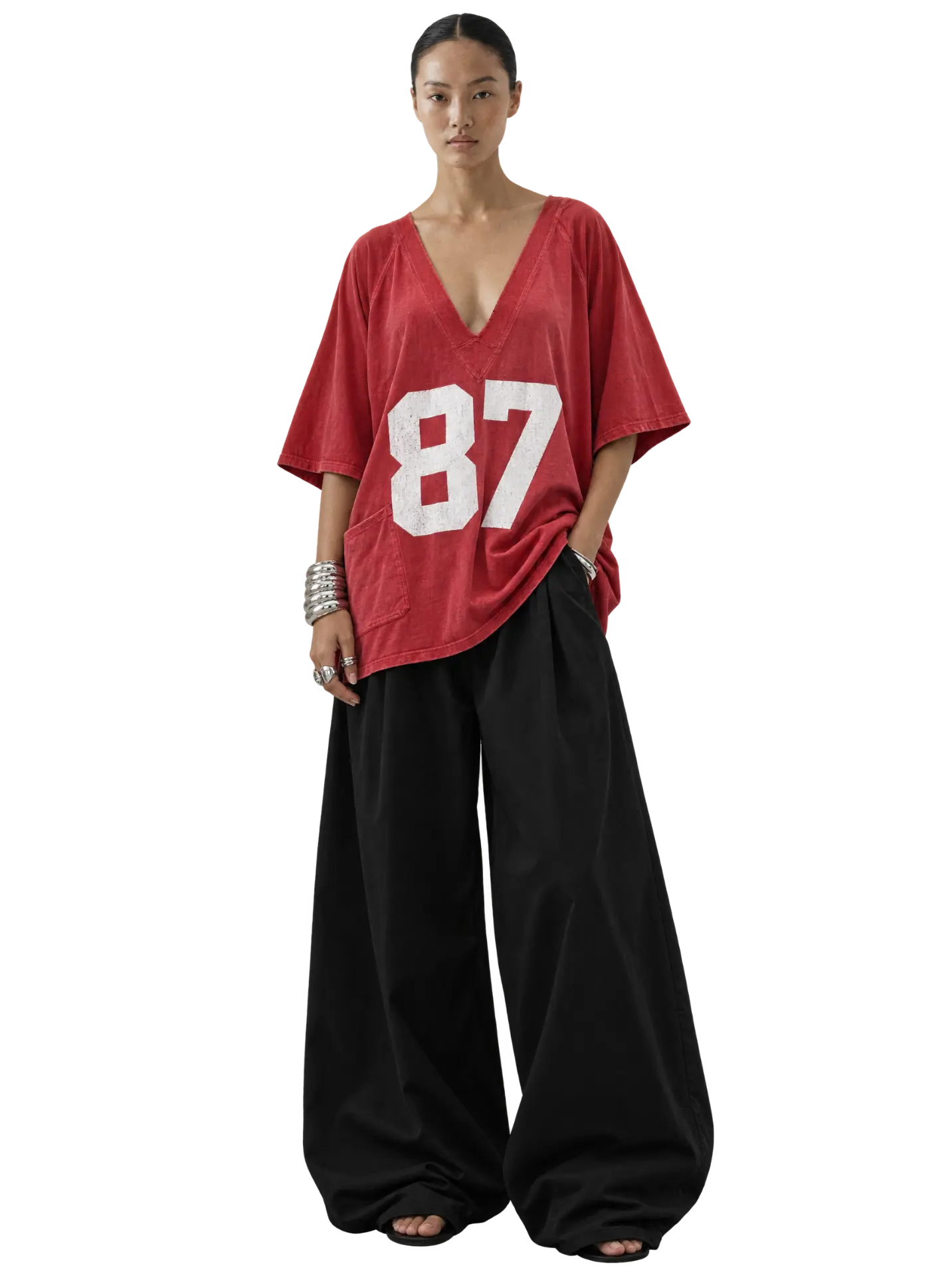 '87 Tunic in Washed Red with black wide-leg trousers
